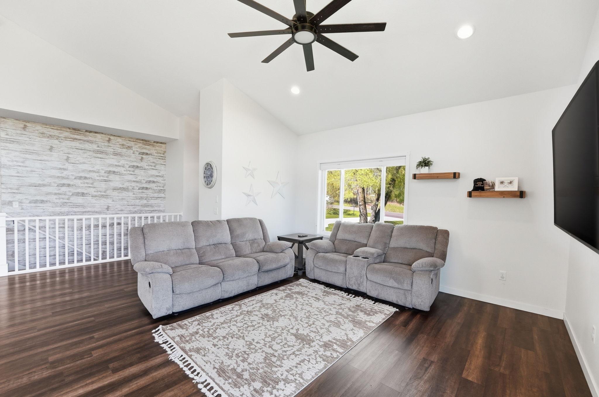 Living area includes a ceiling fan for enhanced everyday livability.