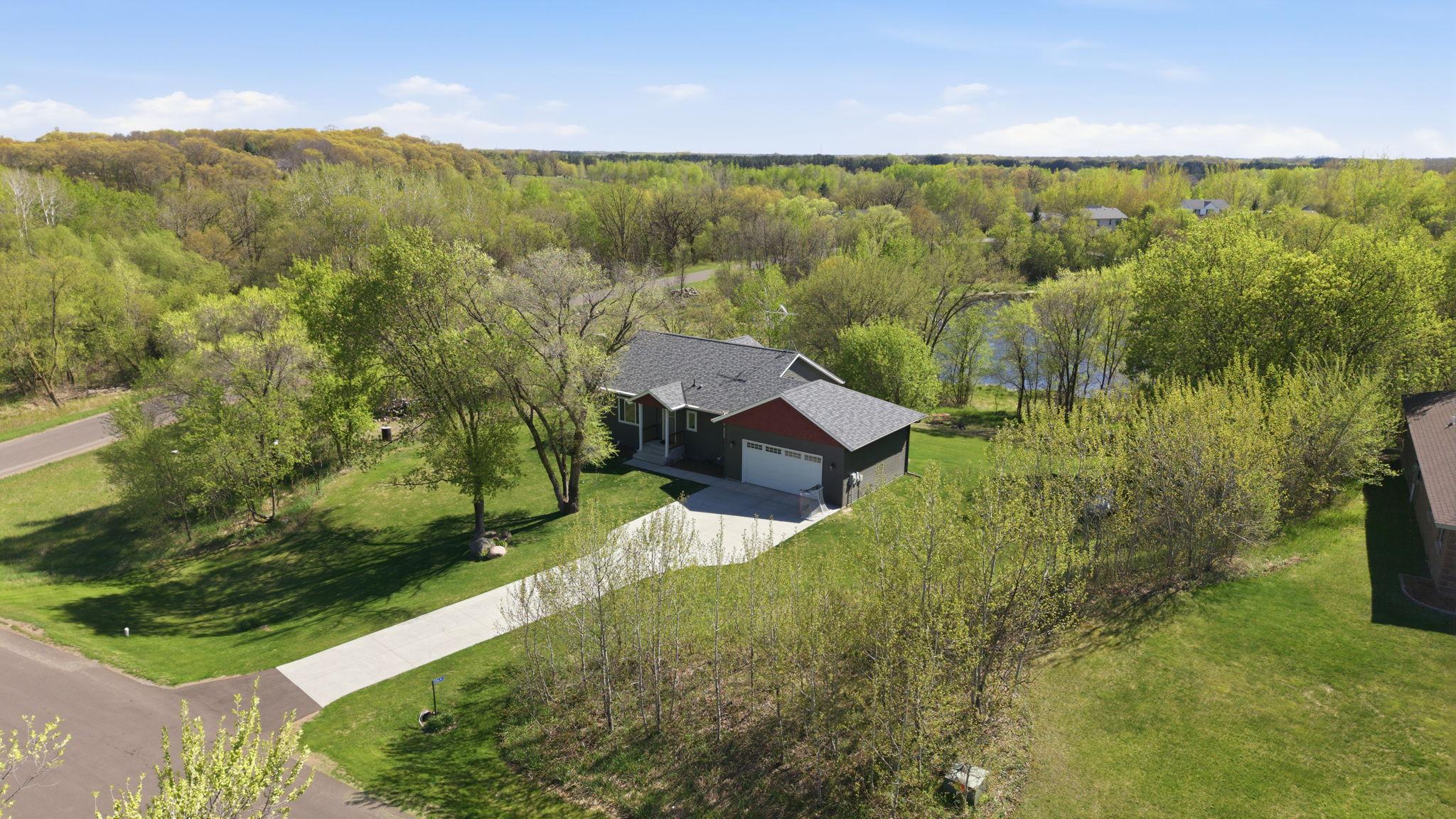 Aerial views clearly display the property’s placement and outdoor features.