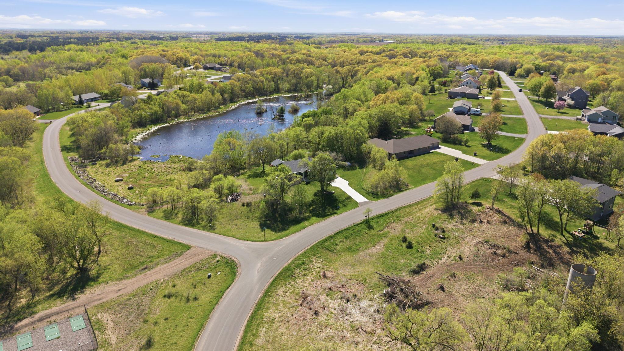 Drone photography captures stunning lake views and waterfront setting.