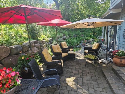 Beautiful backyard with water feature and paver patio