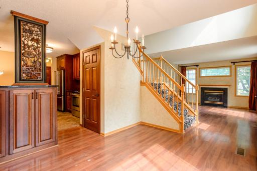 Open-concept layout connects the dining area, kitchen, and living room, creating a welcoming space ideal for everyday living and gatherings.