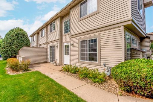Spacious concrete patio provides the ideal outdoor retreat with room for grilling, dining, or enjoying the outdoors.