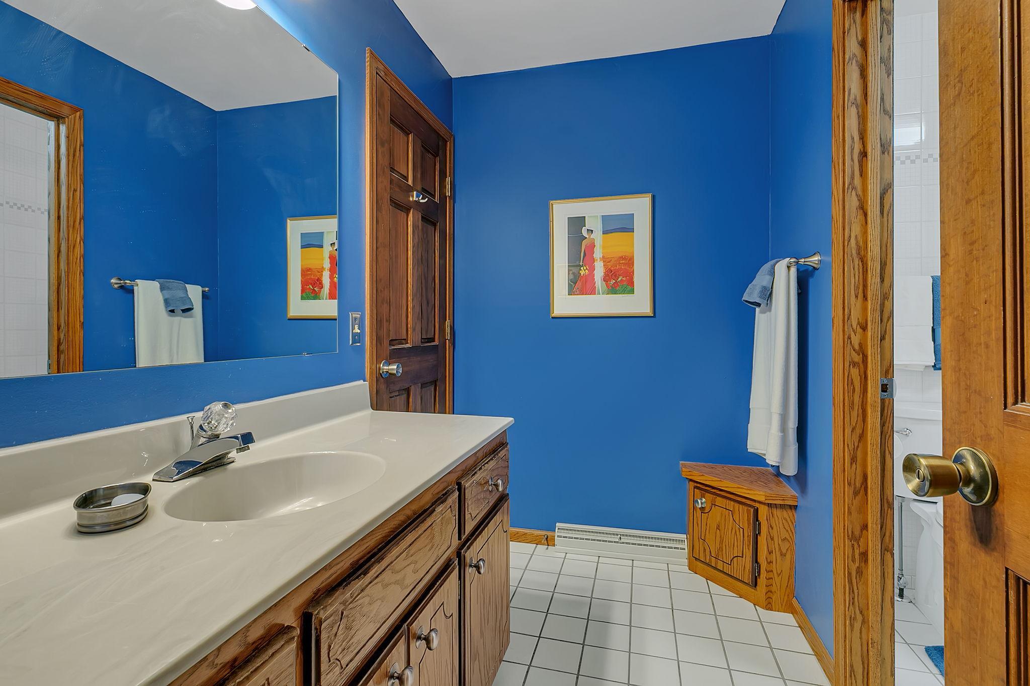 Shared walk through bathroom.
