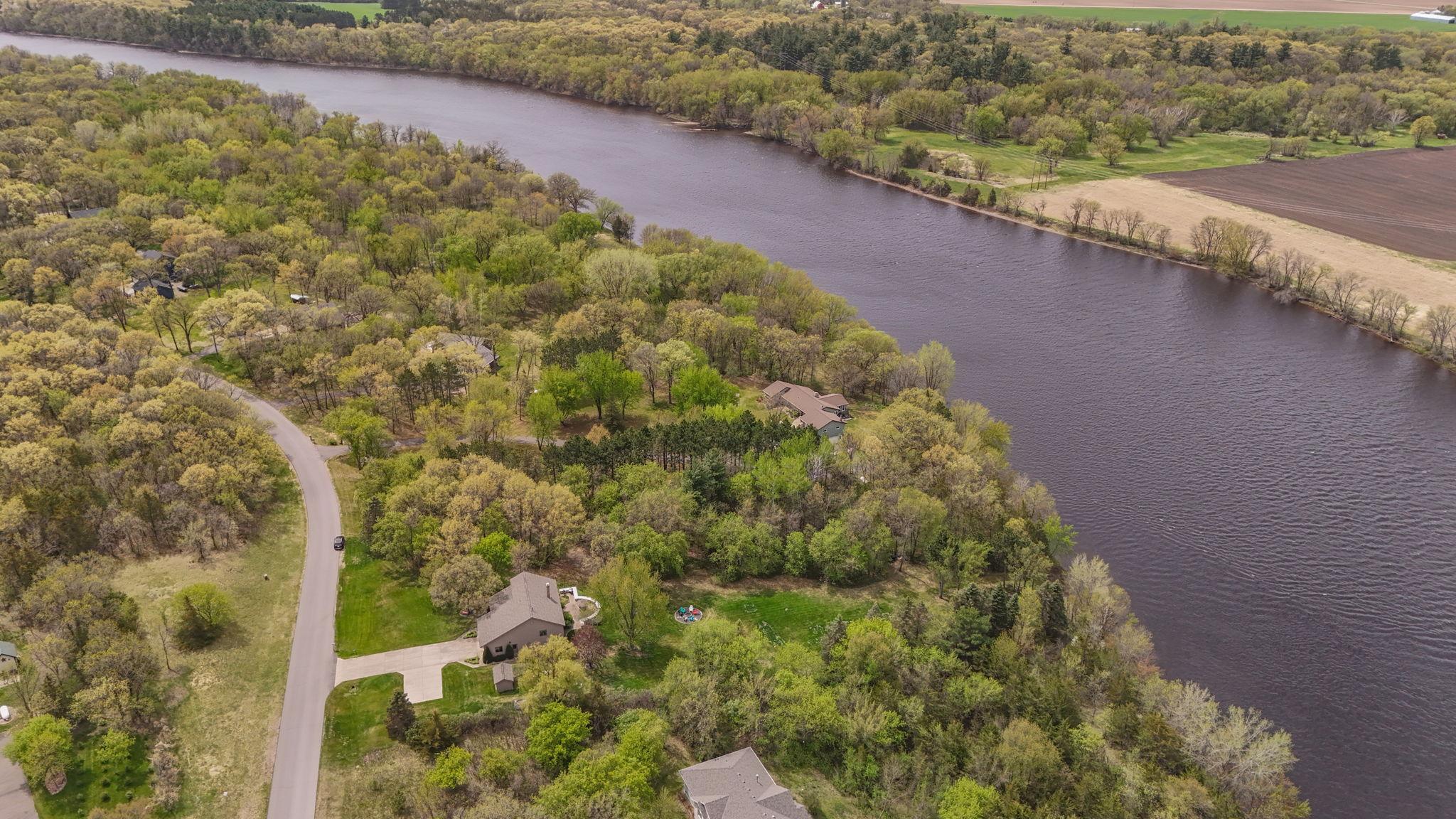 Private setting surrounded by mature trees and natural landscape.