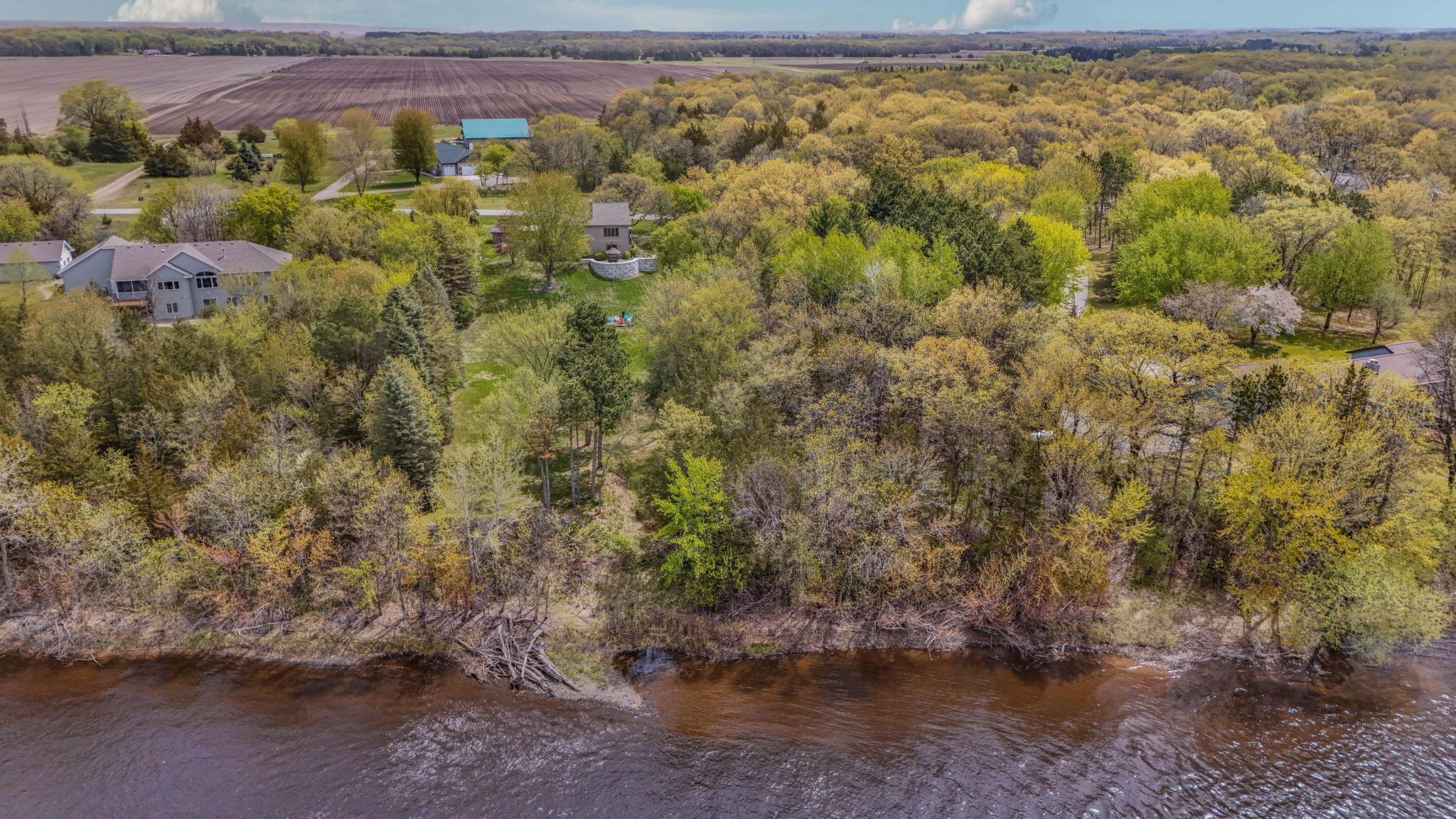Stunning mature trees frame the property with timeless natural charm.