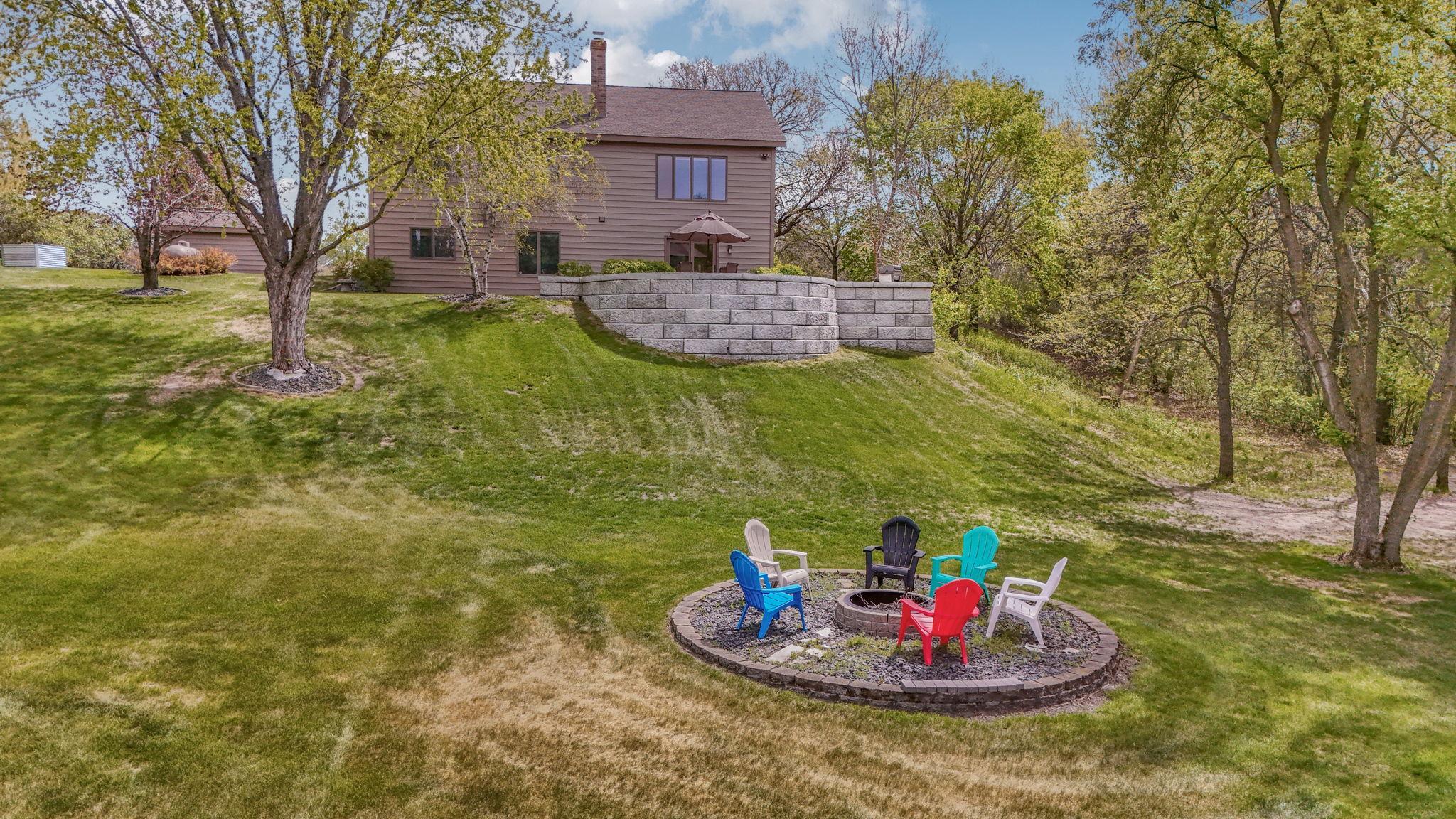 Back of home designed to maximize outdoor enjoyment and functionality.