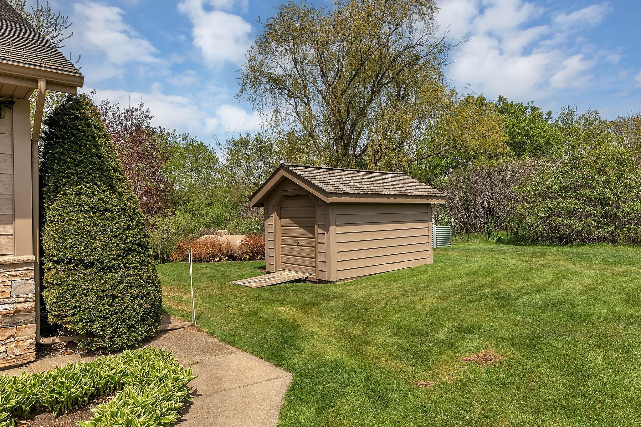 Property features a utility shed.