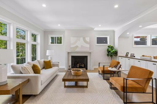 Quartz Fireplace Surround + Credenza w/Arched Accent & White Oak Top