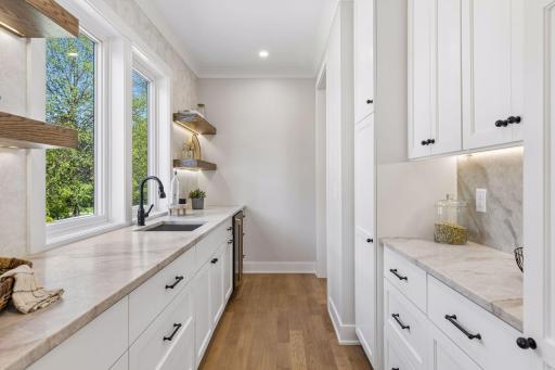 Large Butlers Pantry + Taj Mahal Countertops + White Oak Floating Shelving