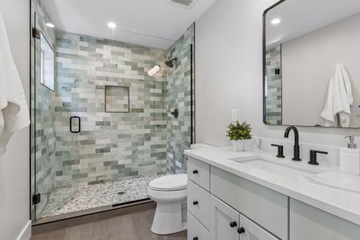 3/4 Bath w/custom time surround and glass door