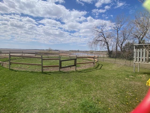 Round pen overlooking the pond