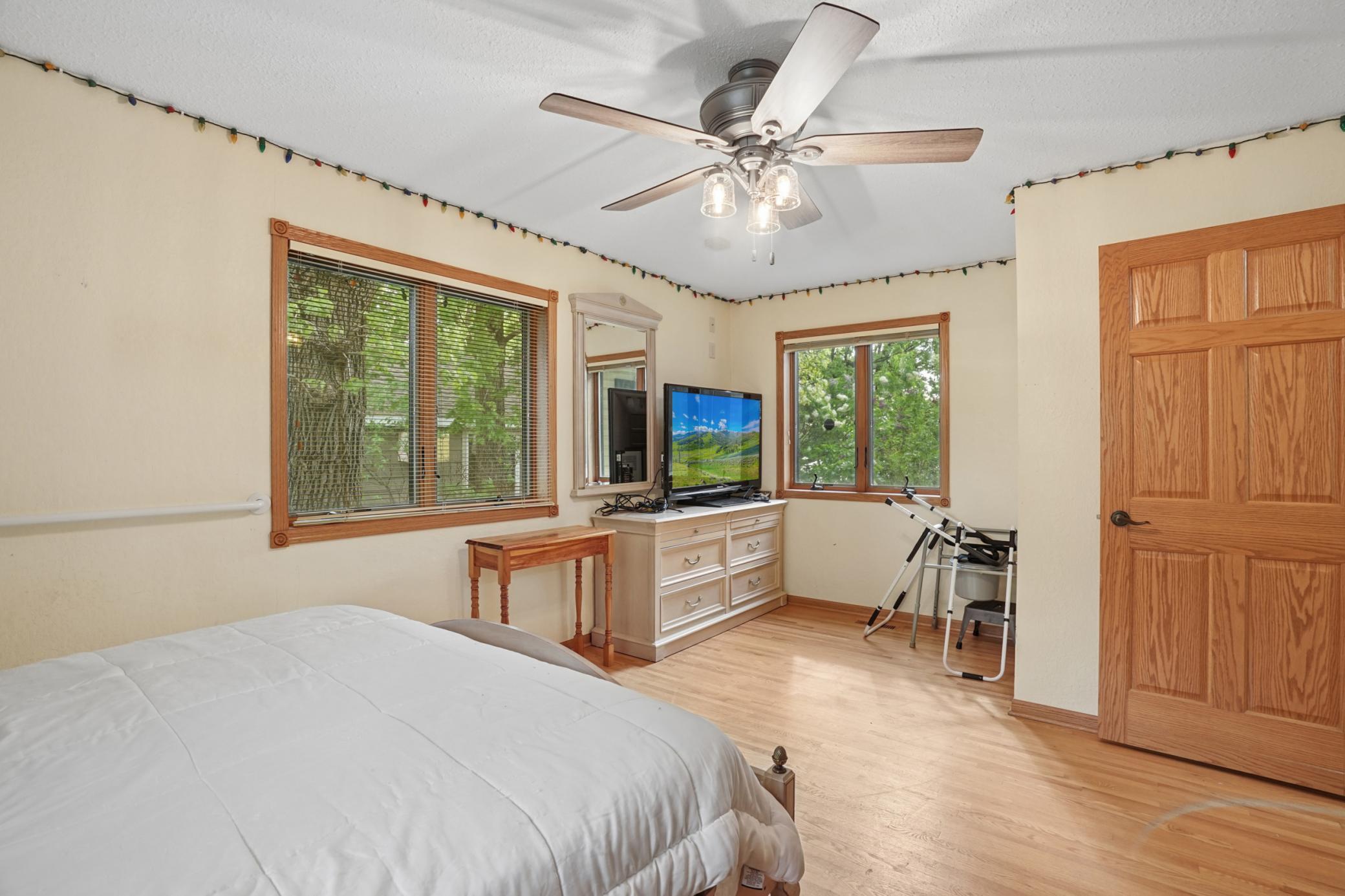 This is the larger of the two main floor bedrooms which has a nice large window overlooking the lake!