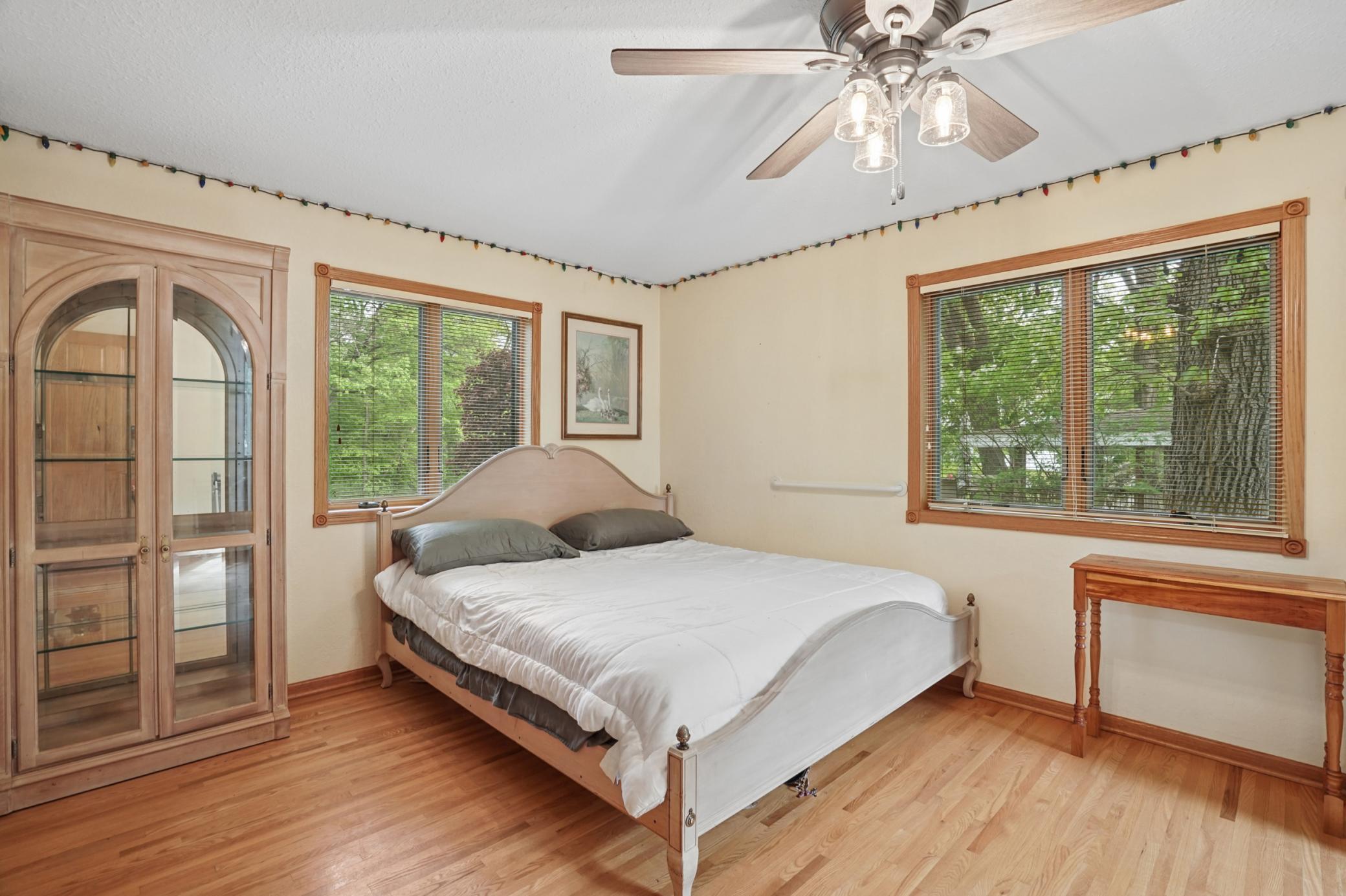Plenty of room for a queen or a king bed with wood floors.