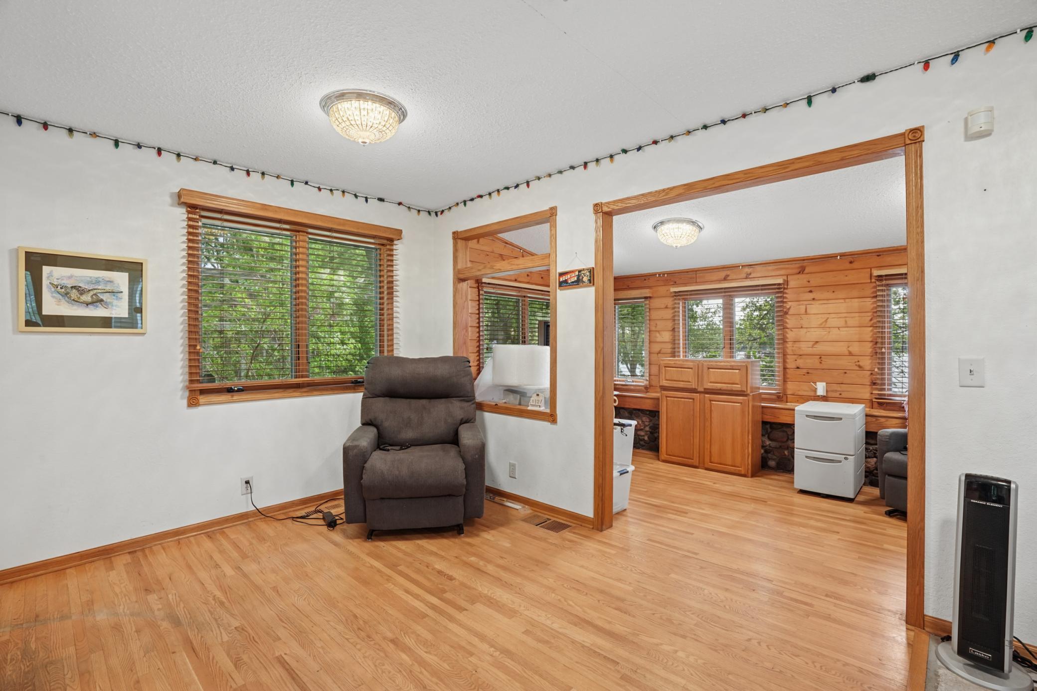 Another open sitting area between the kitchen and living room.