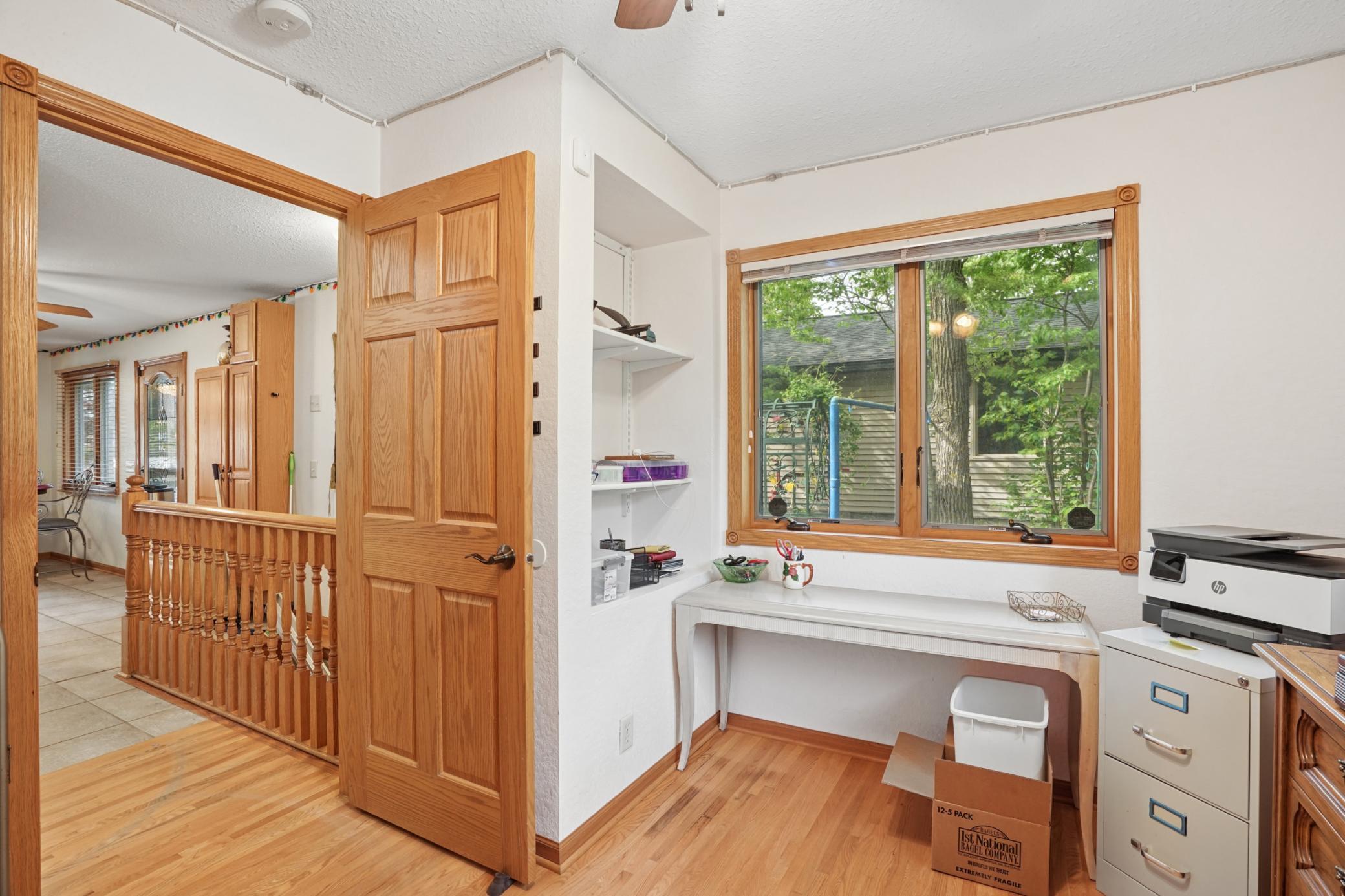 Currently used for office and craft work, this is the second of the two main floor bedrooms.