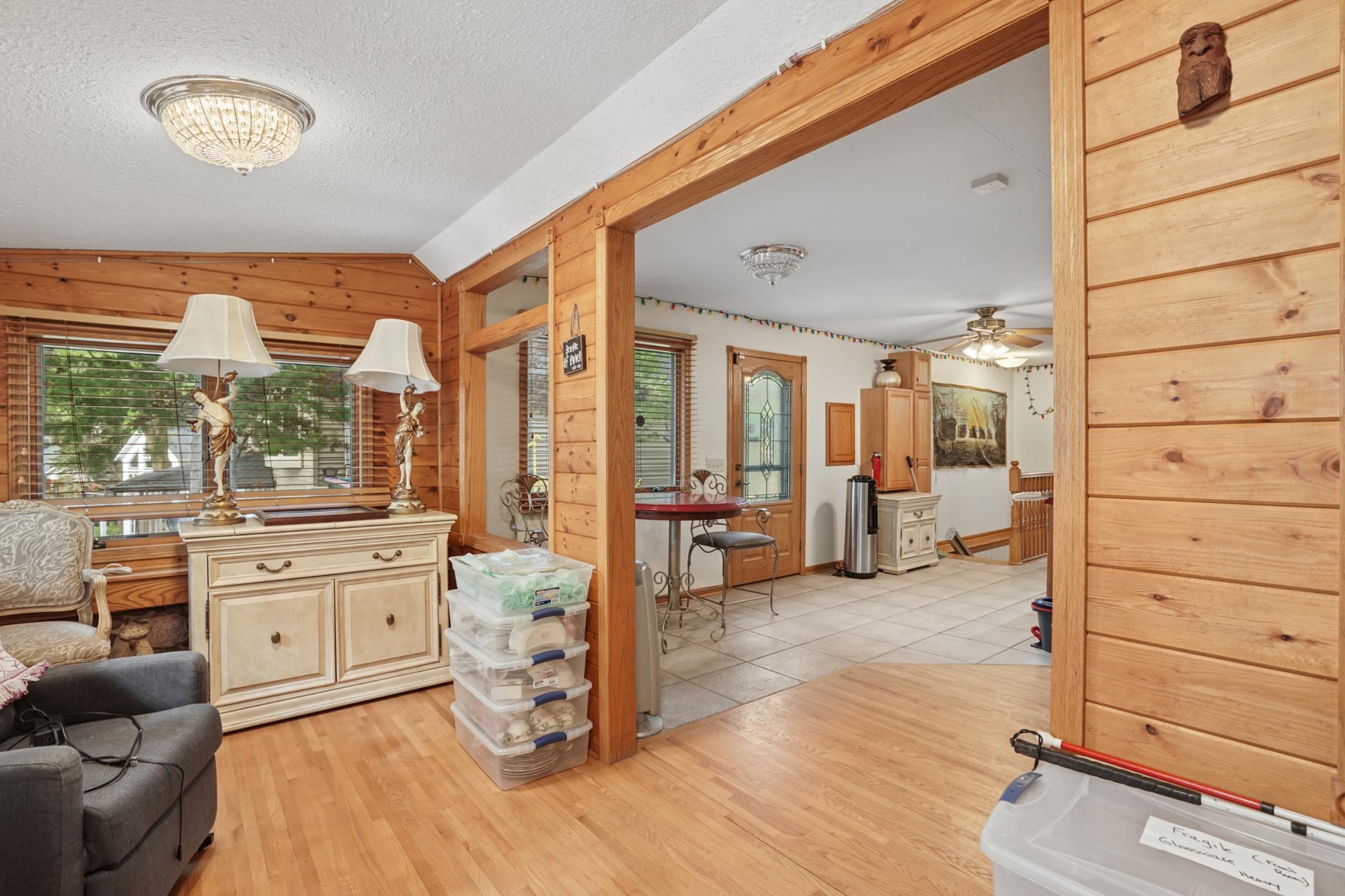 The sitting/family room which opens up to the dining/kitchen areas.