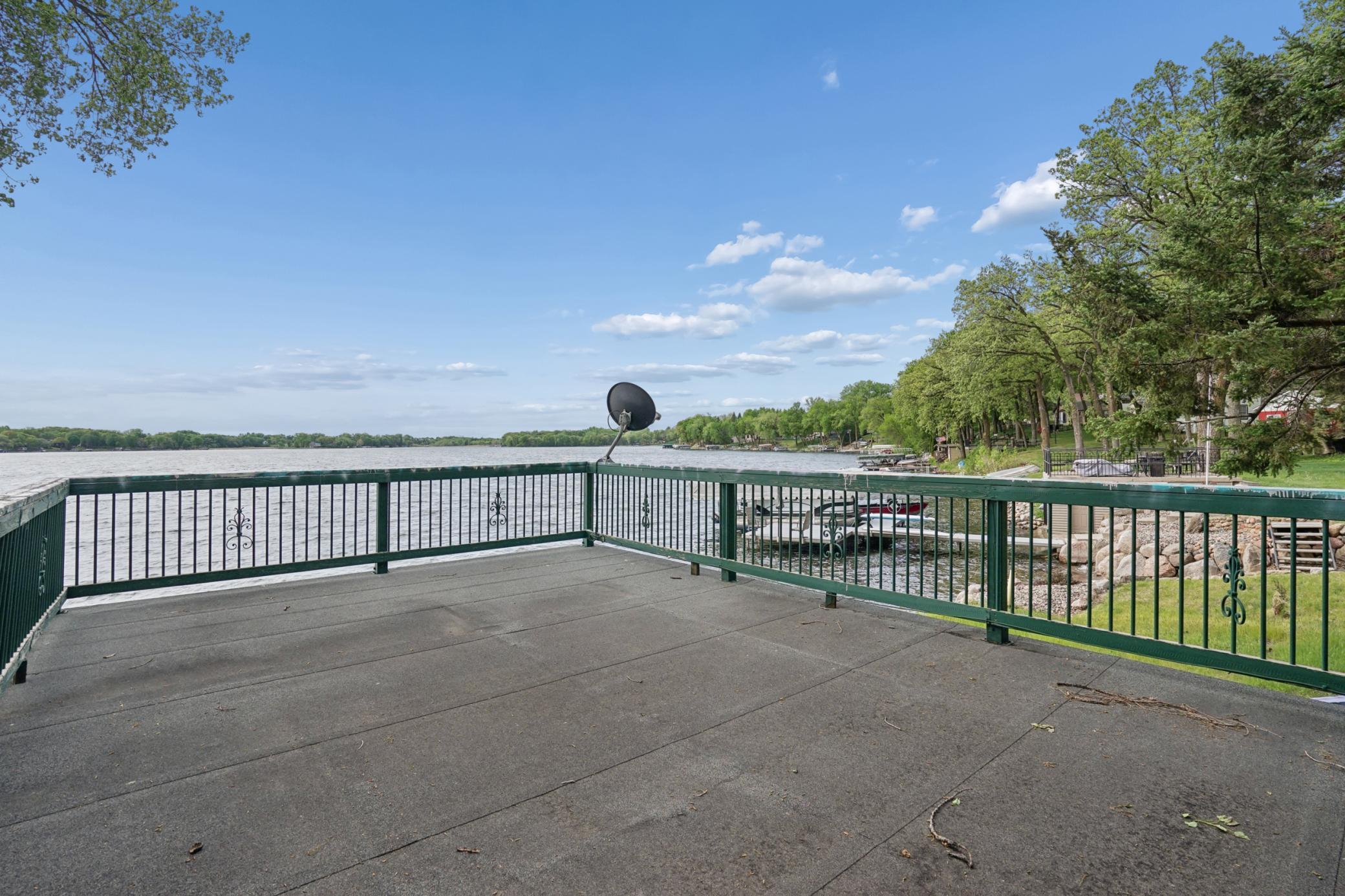 The deck on top has amazing clear panoramic views of Cedar Lake and measures 16x24.