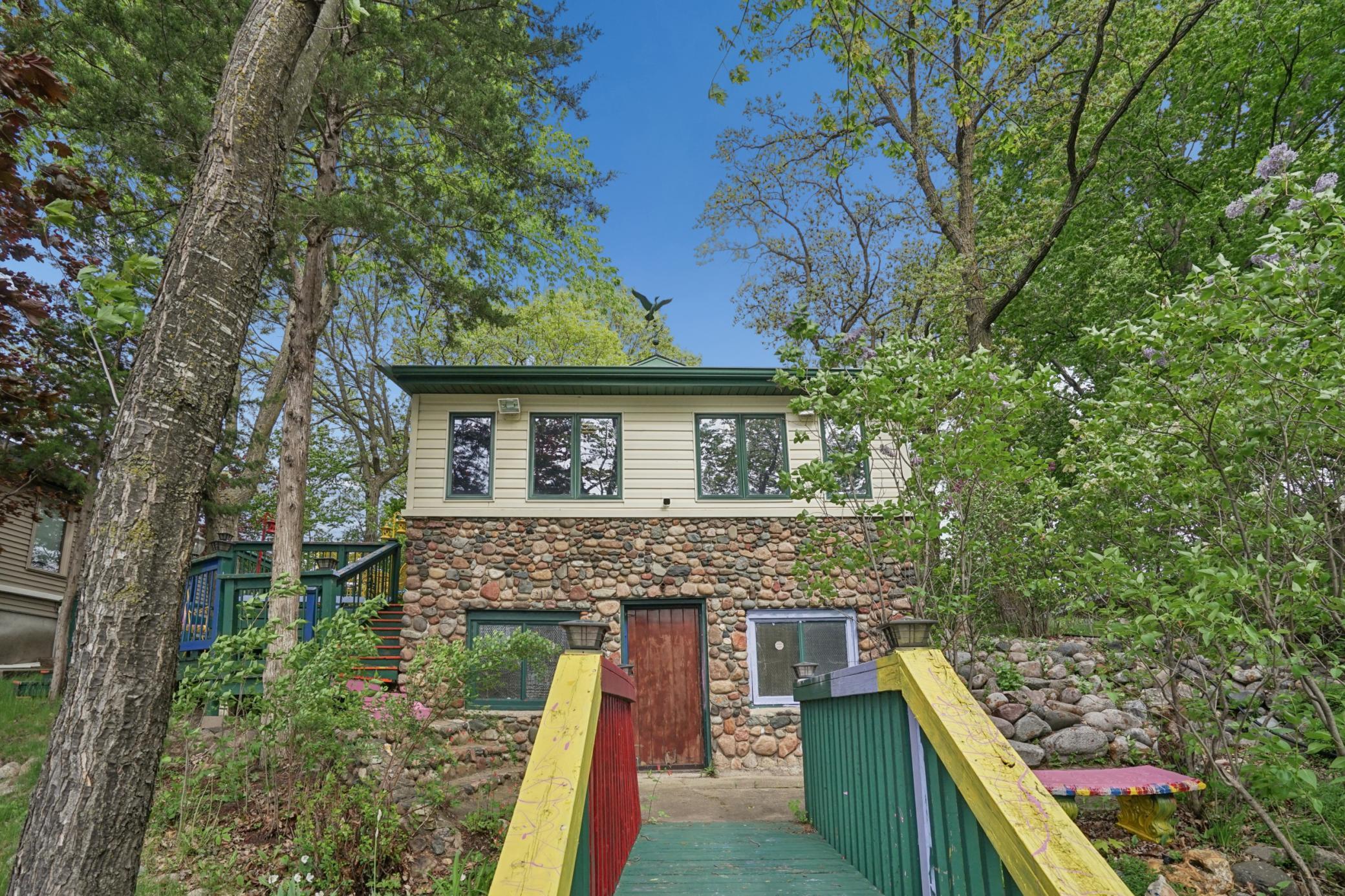 Amazing orig character with the field stone/mortar exterior below the maintenance free siding.