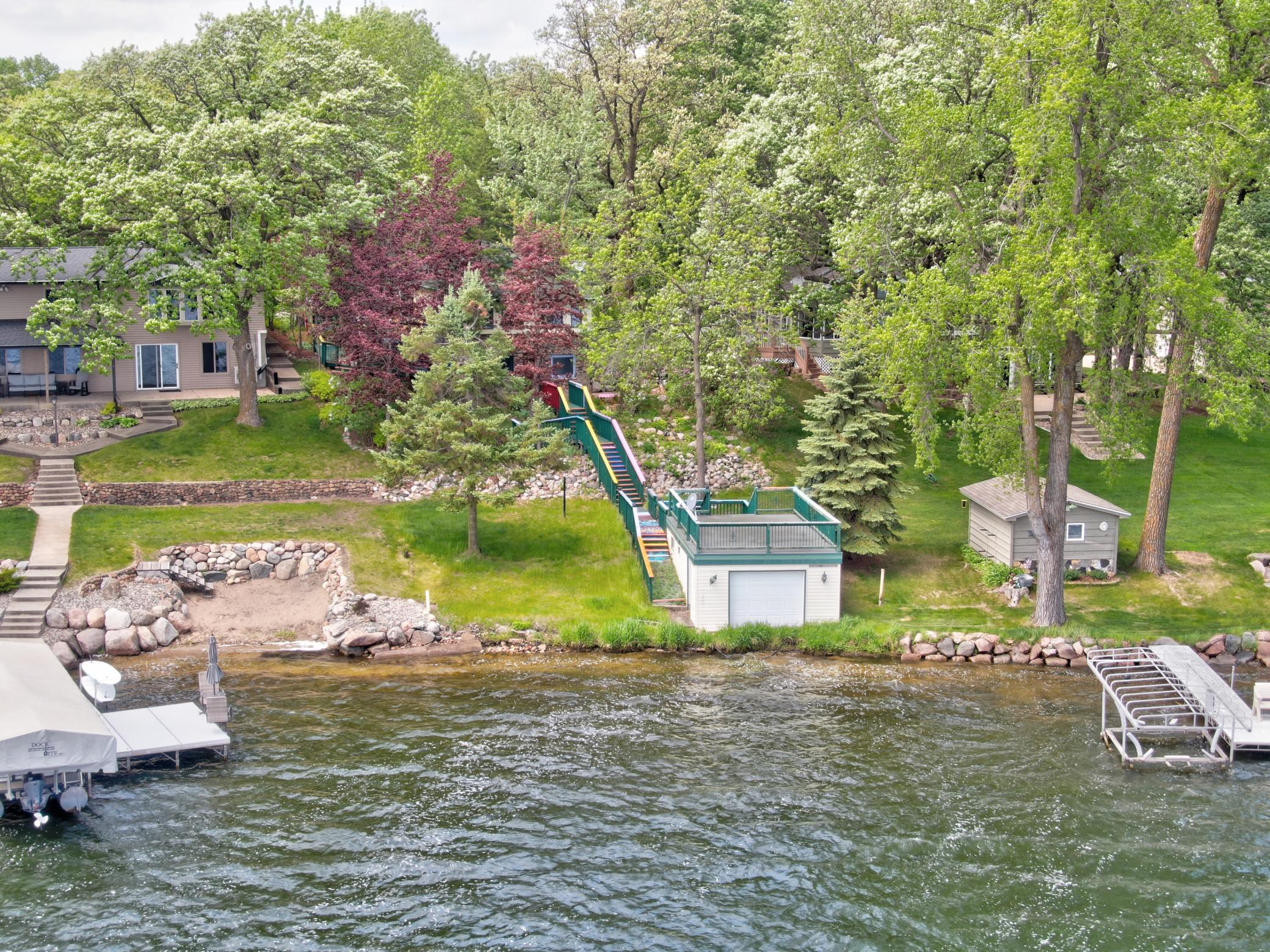 The boathouse serves amazing purpose including a massive deck on top!