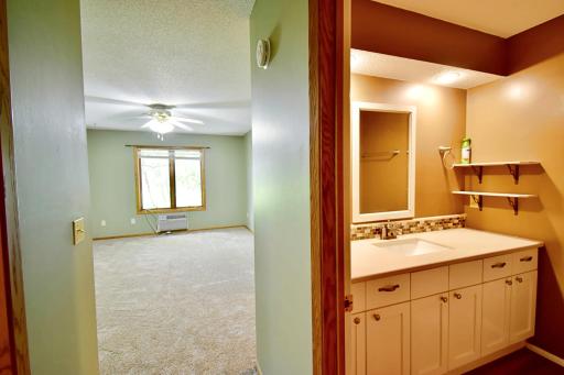 Primary full bathroom is just inside the door on the right