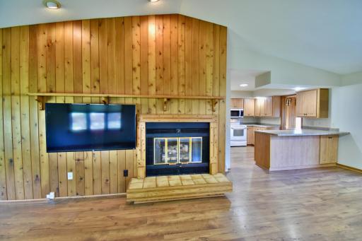 The fireplace makes a great focal point in the center of the room