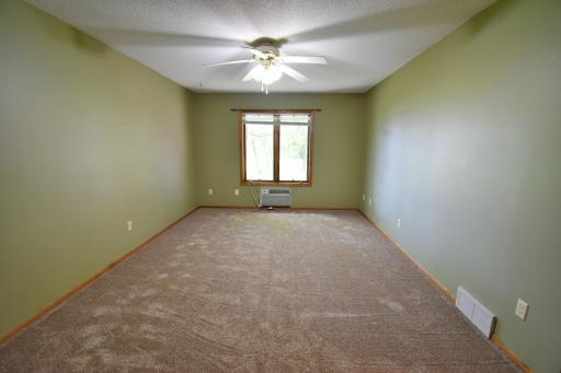Primary bedroom has just recently had new carpeting added!