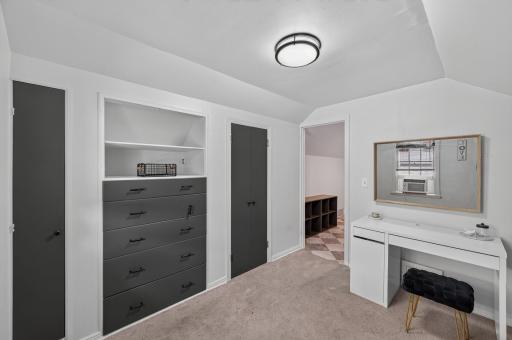 Thoughtfully designed storage and workspace maximize functionality on the upper level.