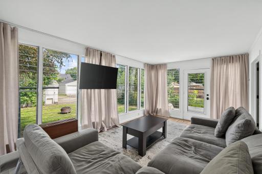 Walls of windows bring the outdoors in while maintaining year-round comfort.