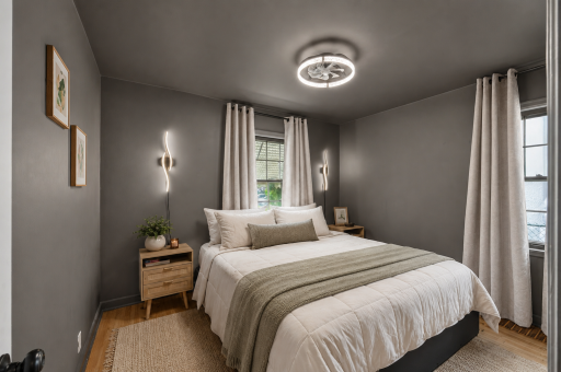 Color-drenched walls create a cozy and sophisticated retreat, complemented by hardwood floors and abundant natural light. *Virtually Staged*