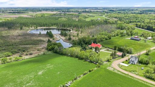 Overlooking a stunning 10 acre spring fed pond, the property offers incredible sunrise views, peaceful privacy and an unforgettable connection to nature.