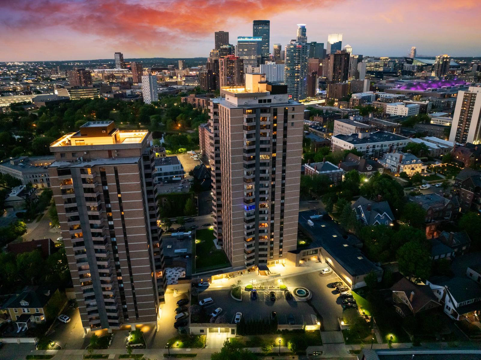 Summit house w/ rooftops and parking lot twilight .jpg