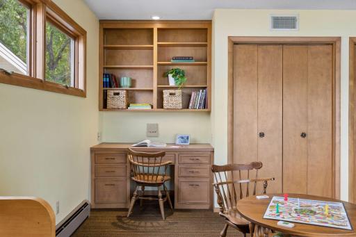 Main Floor Family Room with built in desk, shelving and closet storage - 0023.jpg