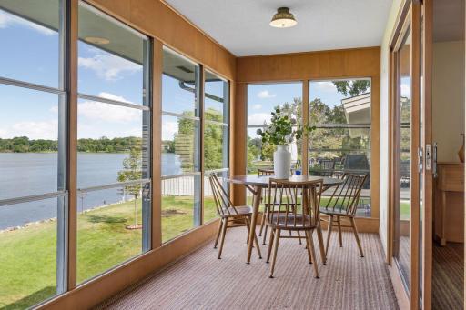 Three Season Porch overlooking the backyard and lake - 0024.jpg
