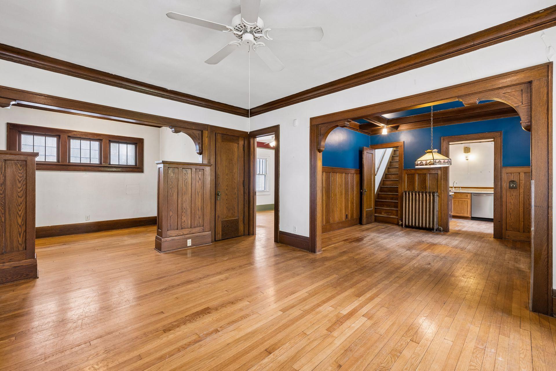 Living room open to library on left and dinging room on right