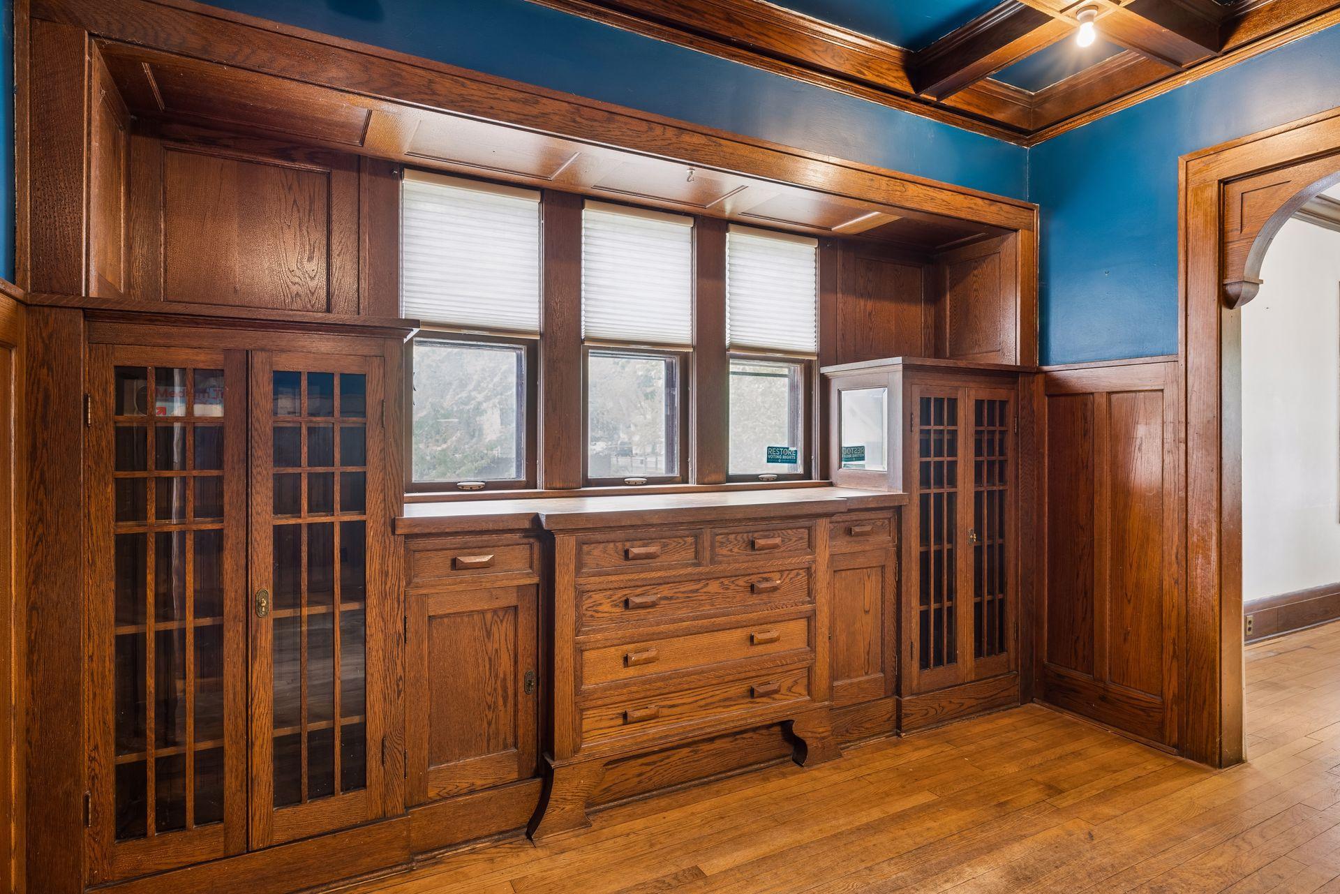 Full wall of built in cabinetry in dining rooom