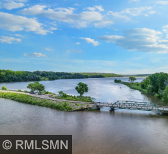 Discover 12 acres of scenic hiking trails and breathtaking views of the Mississippi River at Grey Cloud Dunes.