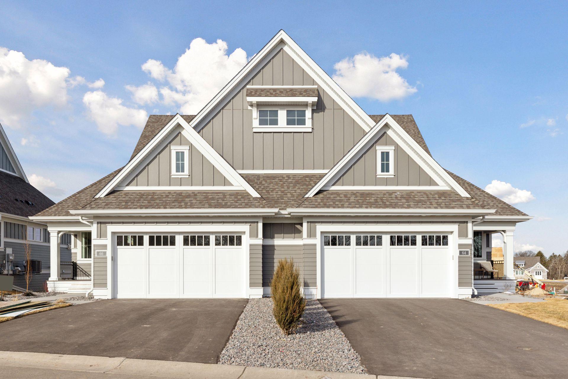 Another completed Charles Cudd custom home! (unit is on the right) NOTE: Photo is of a similar home in the Spring Farm neighborhood.