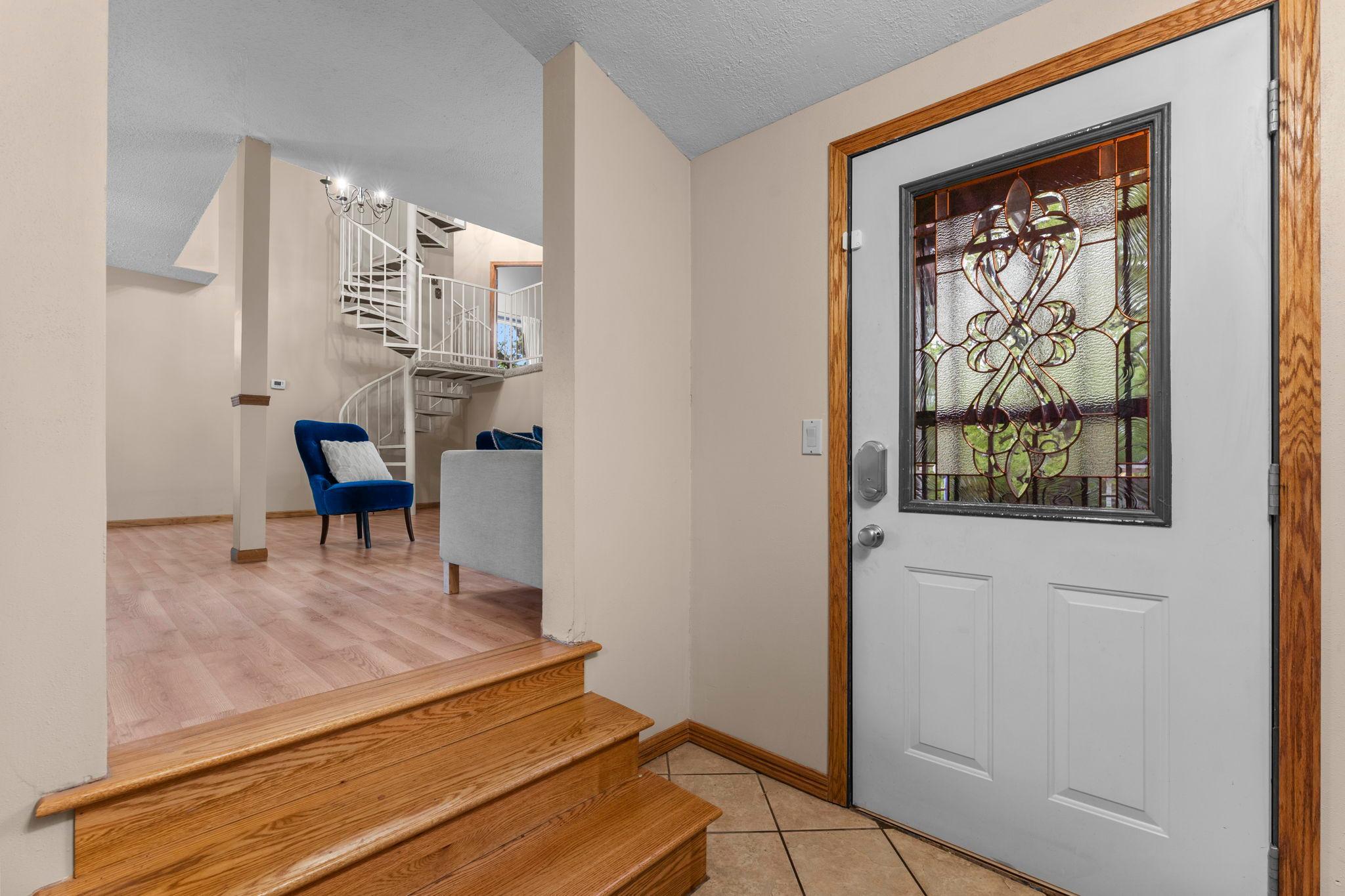 Separate entryway leads to main living room space