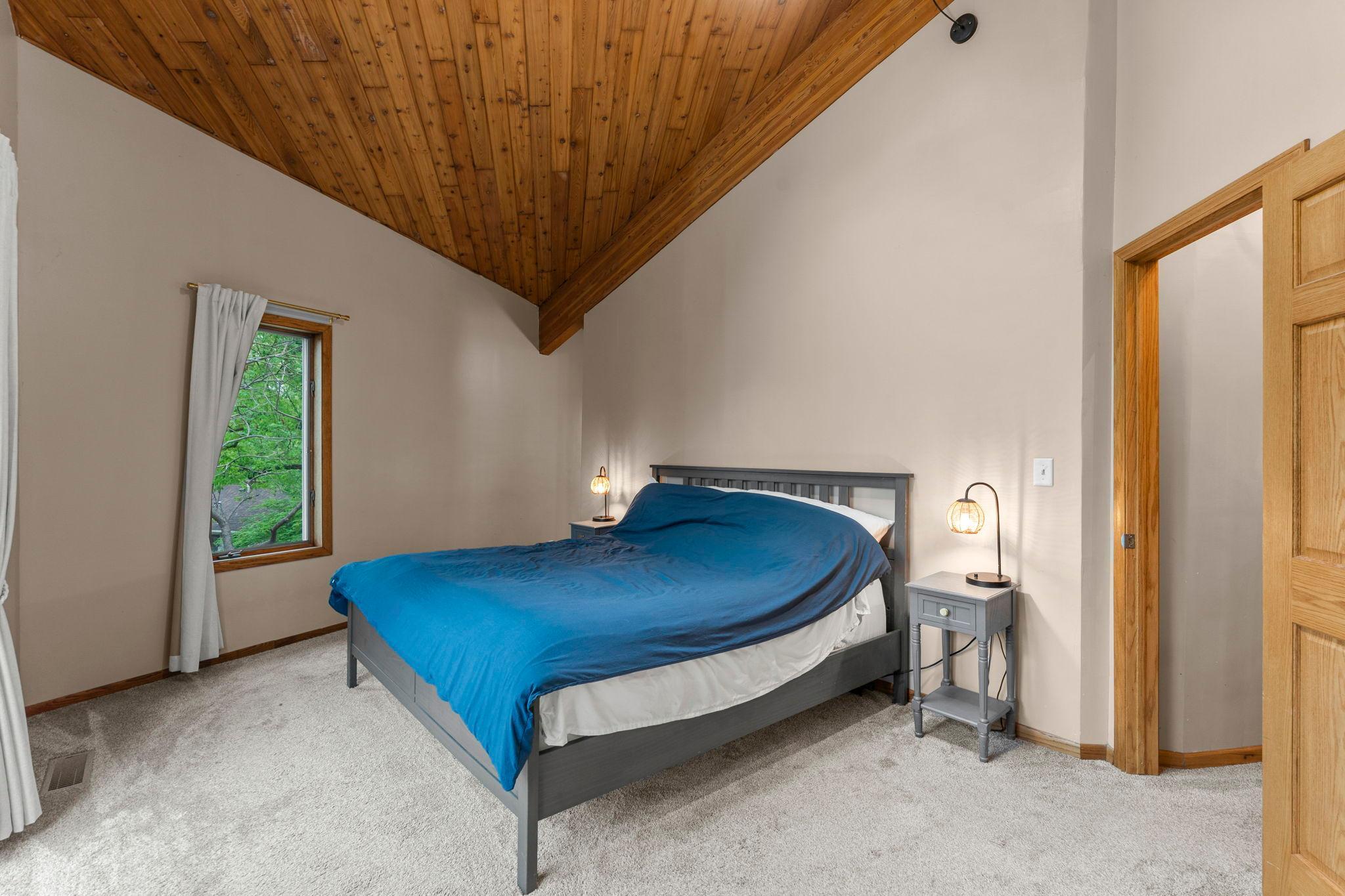 Wood vaulted ceilings in uppler level bedrooms
