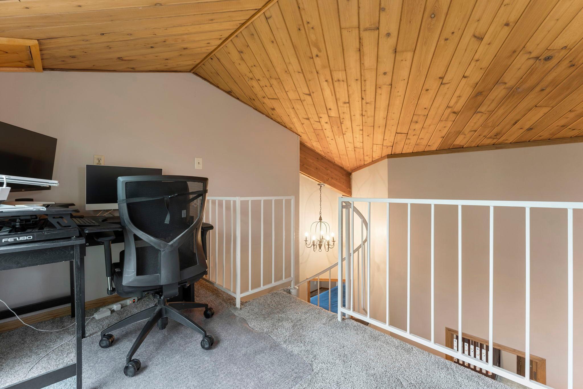 Office at top of spiral staircase