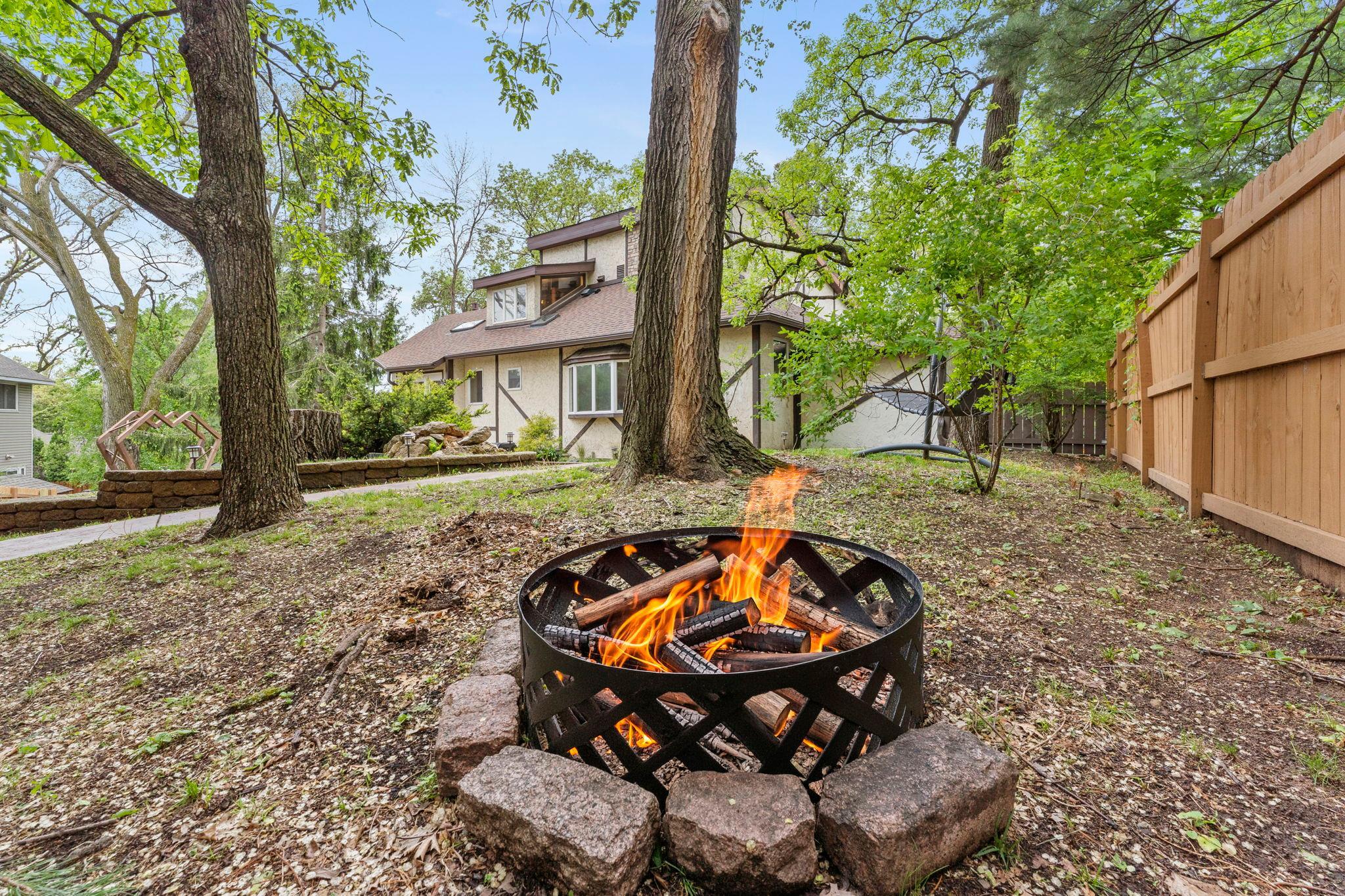 Numerous large trees and firepit