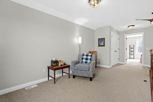 Versatile upper-level flex space ideal for media room, home office, hobby space or additional living area.