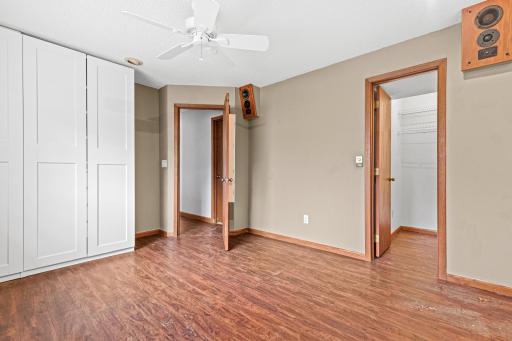 Primary downstairs bedroom with walk-in closet