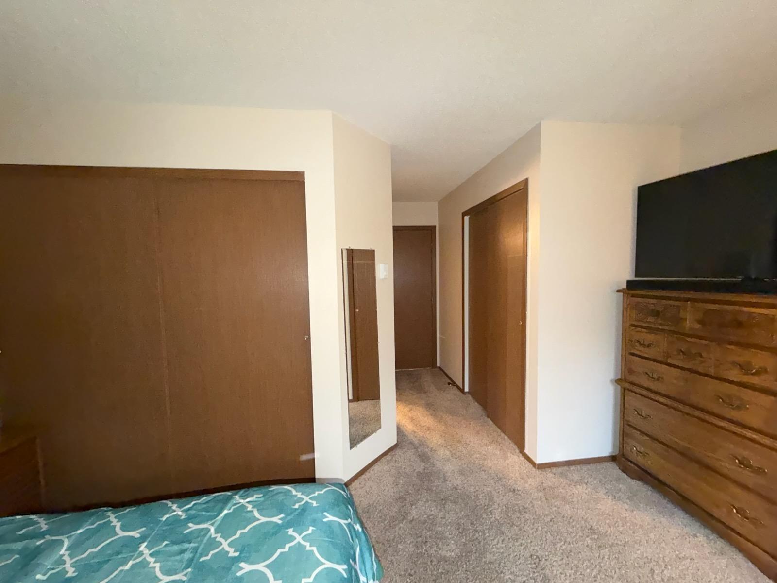 PRIMARY BEDROOM- 2 SETS OF CLOSETS