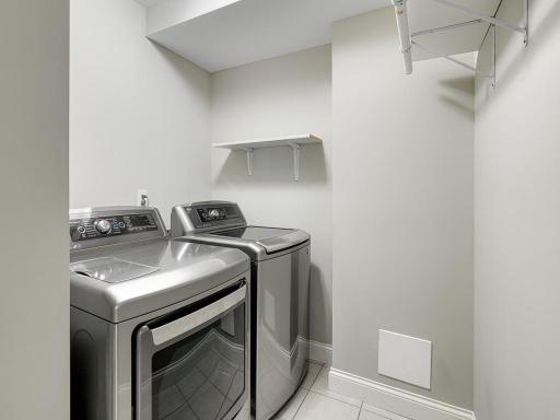 A neat and tidy space for laundry in the lower level.