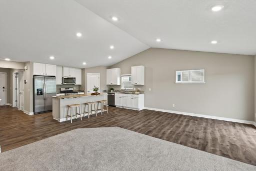 Open floorplan filled with warm natural light.
