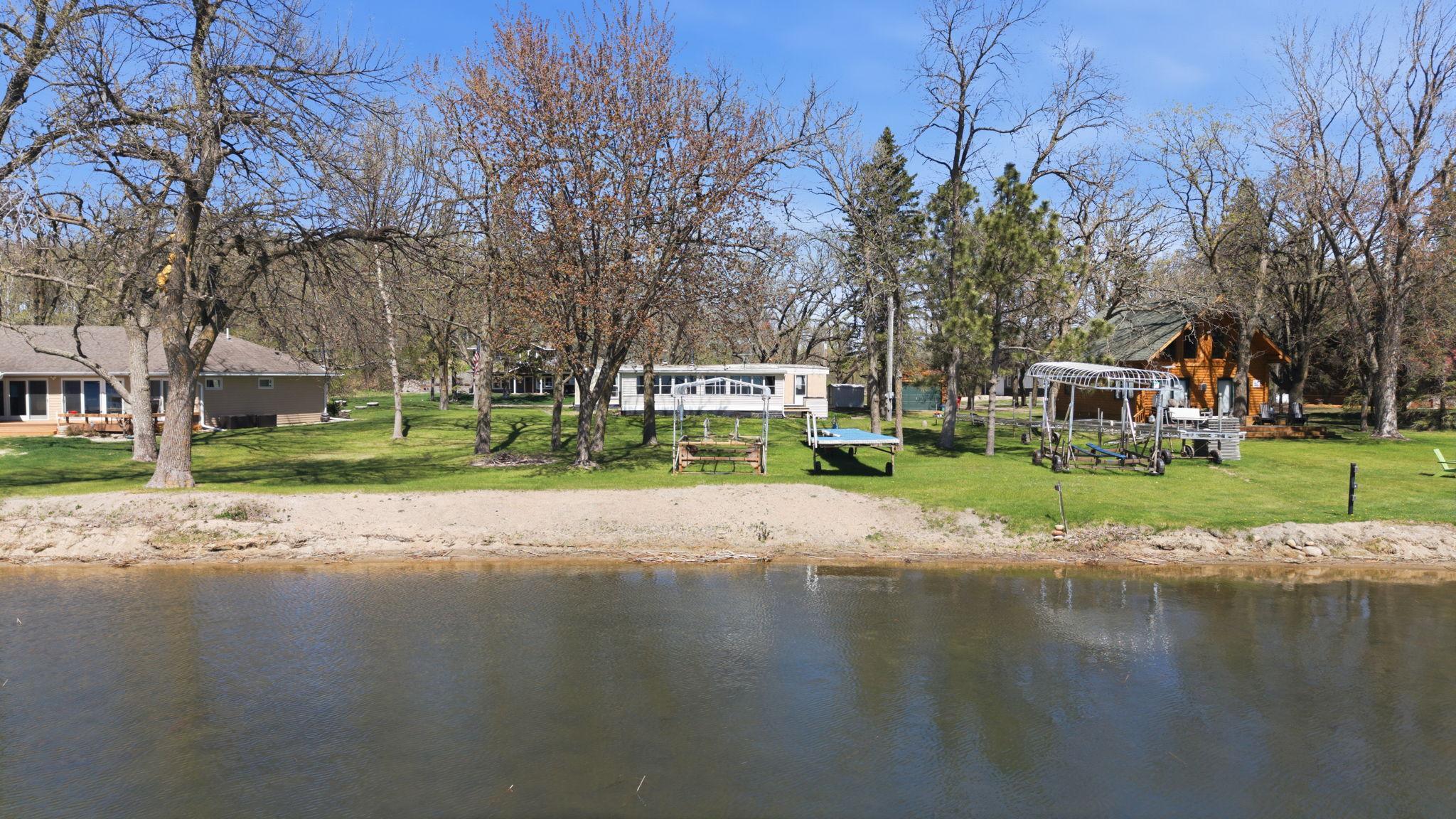 15439 Dittberners Creek Road NW Miltona MN Level lakeshore on Lake Miltona and an amazing beach - Features the cabin, bunk house, garage plus a storage shed - affordable with so much to offer!