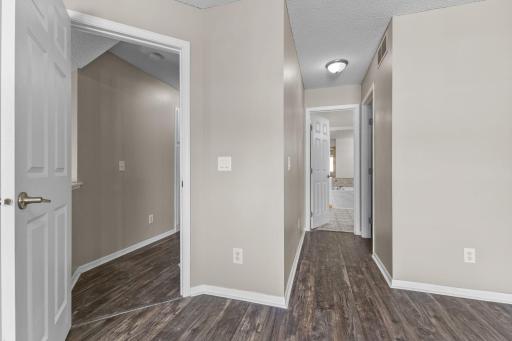 Primary bedroom walks through to full bathroom