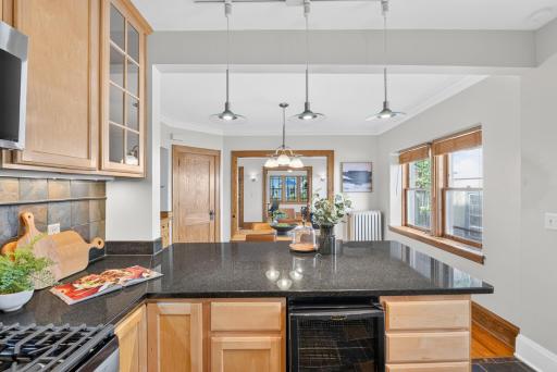 Kitchen opening up to dining and living spaces.jpg