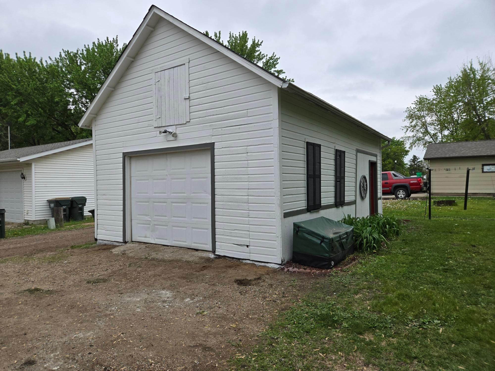 The garage has a loft area for storage above